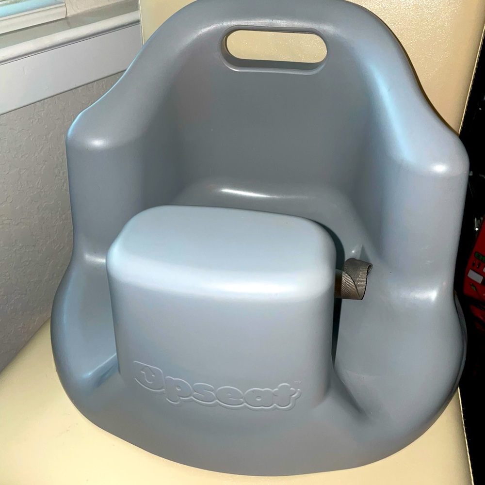 Grey toddler booster seat by UPSEAT